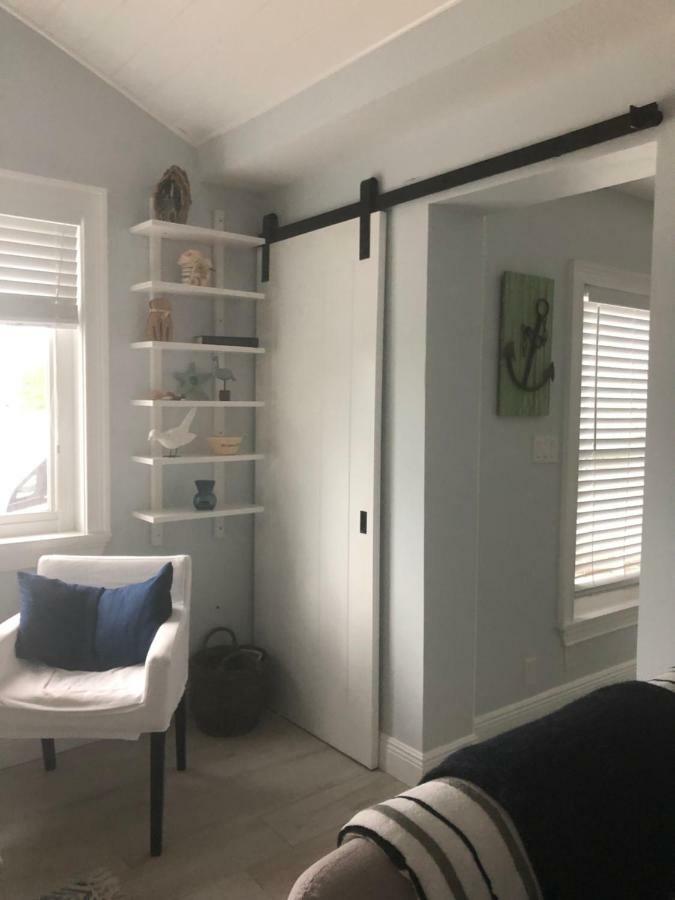 Tides Inn On The Bay Vacation Homes เบรเดนทันบีช ภายนอก รูปภาพ